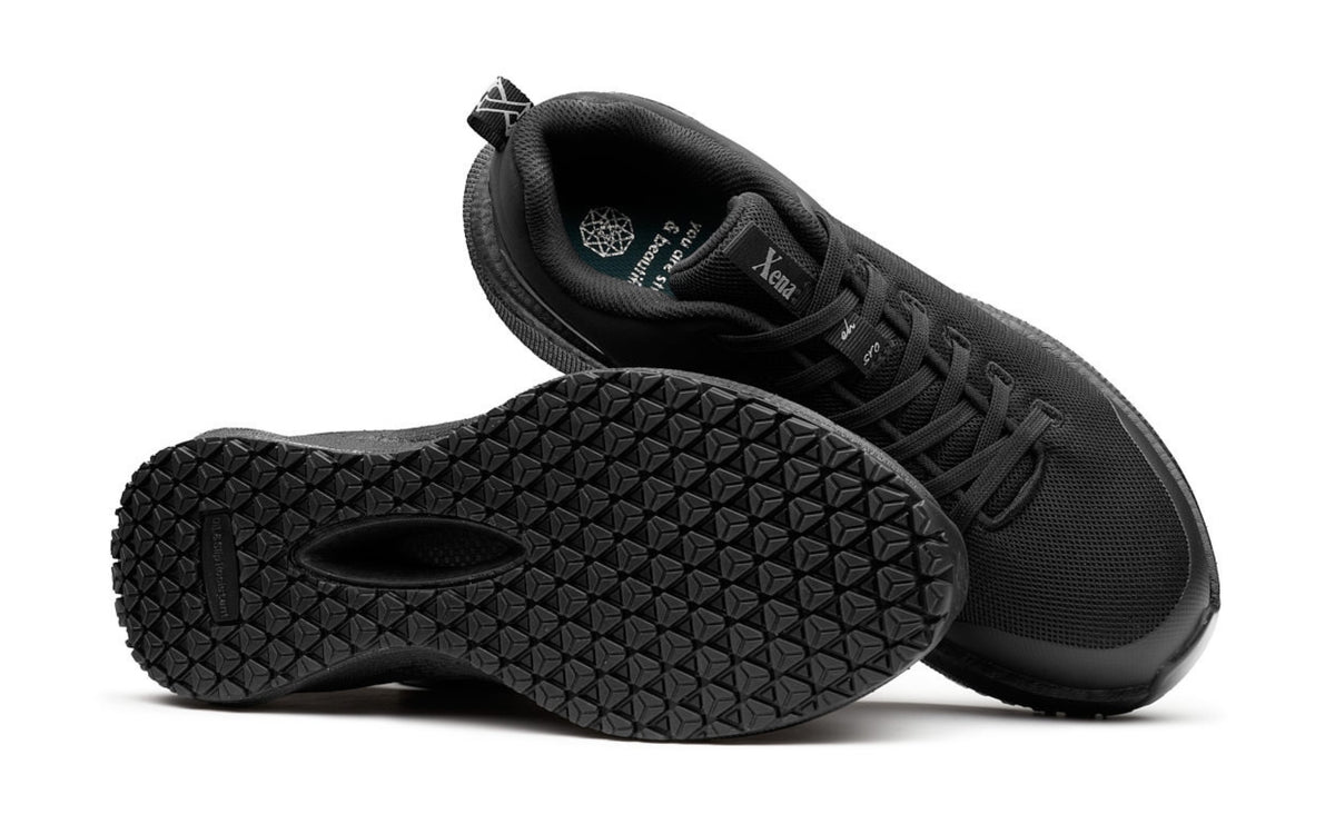 Astra Lite Composite Toe Safety Sneaker for Women — Black Mesh EH Rated · paired view showing slip-resistant SRO outsole tread